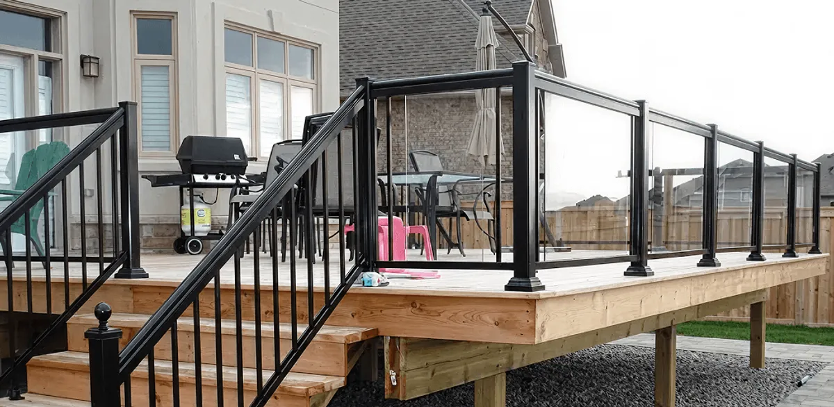Handrail installation on a deck staircase for safety and code compliance in Cape Coral, FL