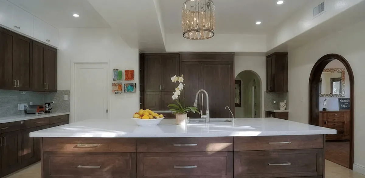 Cabinet refacing project with updated kitchen cabinets and island in Cape Coral, FL